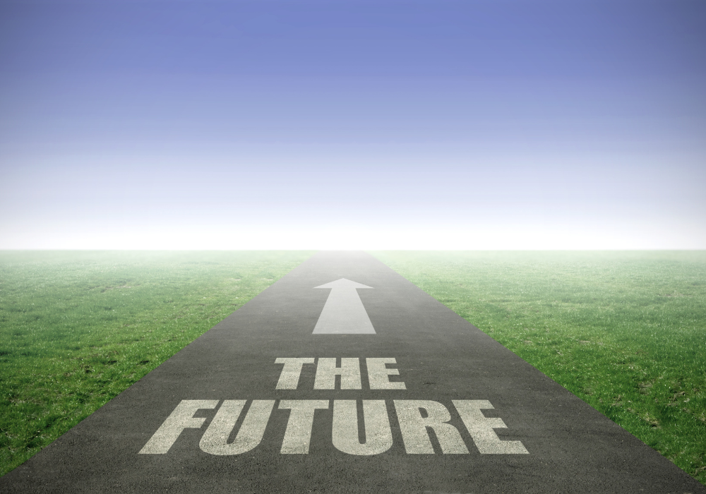 A paved road with the words “THE FUTURE” and a forward-pointing arrow, symbolizing the shift toward sustainable procurement and the journey toward circular supply chain practices.